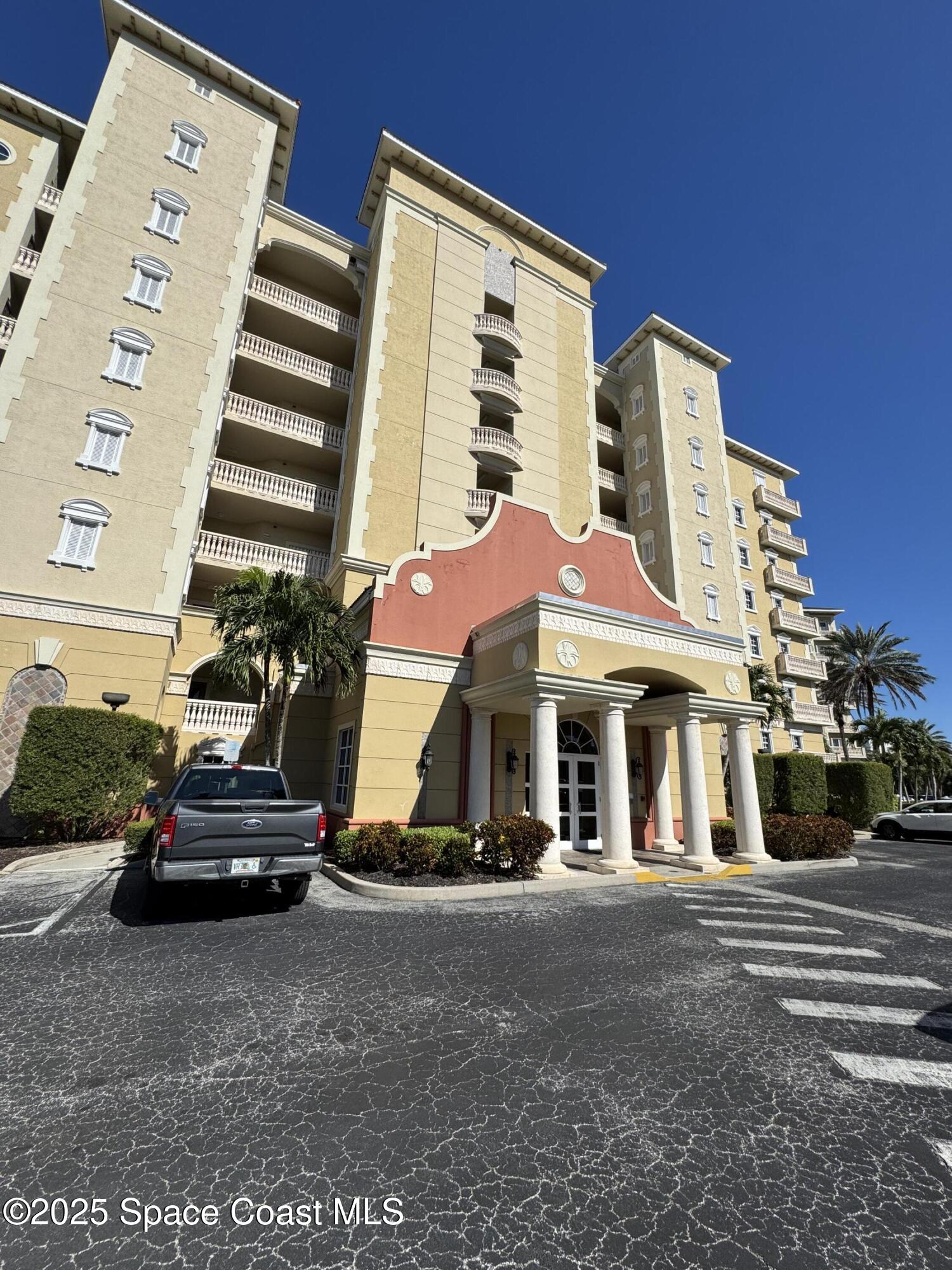 4955 Dixie Highway Northeast, Unit 502 Palm Bay, FL 32905 - Photo 42 of 51 a car parked in front of a building