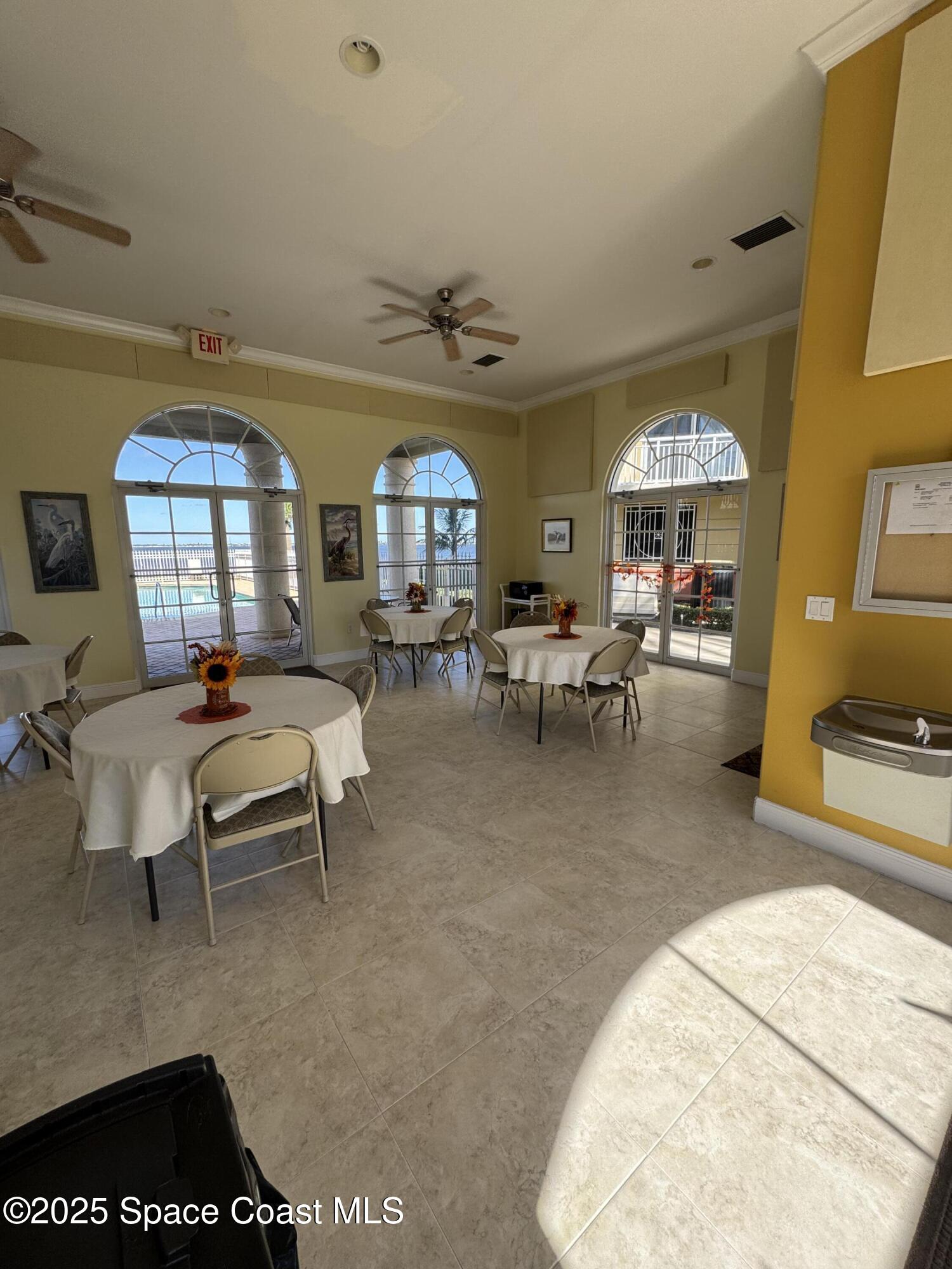 4955 Dixie Highway Northeast, Unit 502 Palm Bay, FL 32905 - Photo 45 of 51 a living room with furniture and a large window