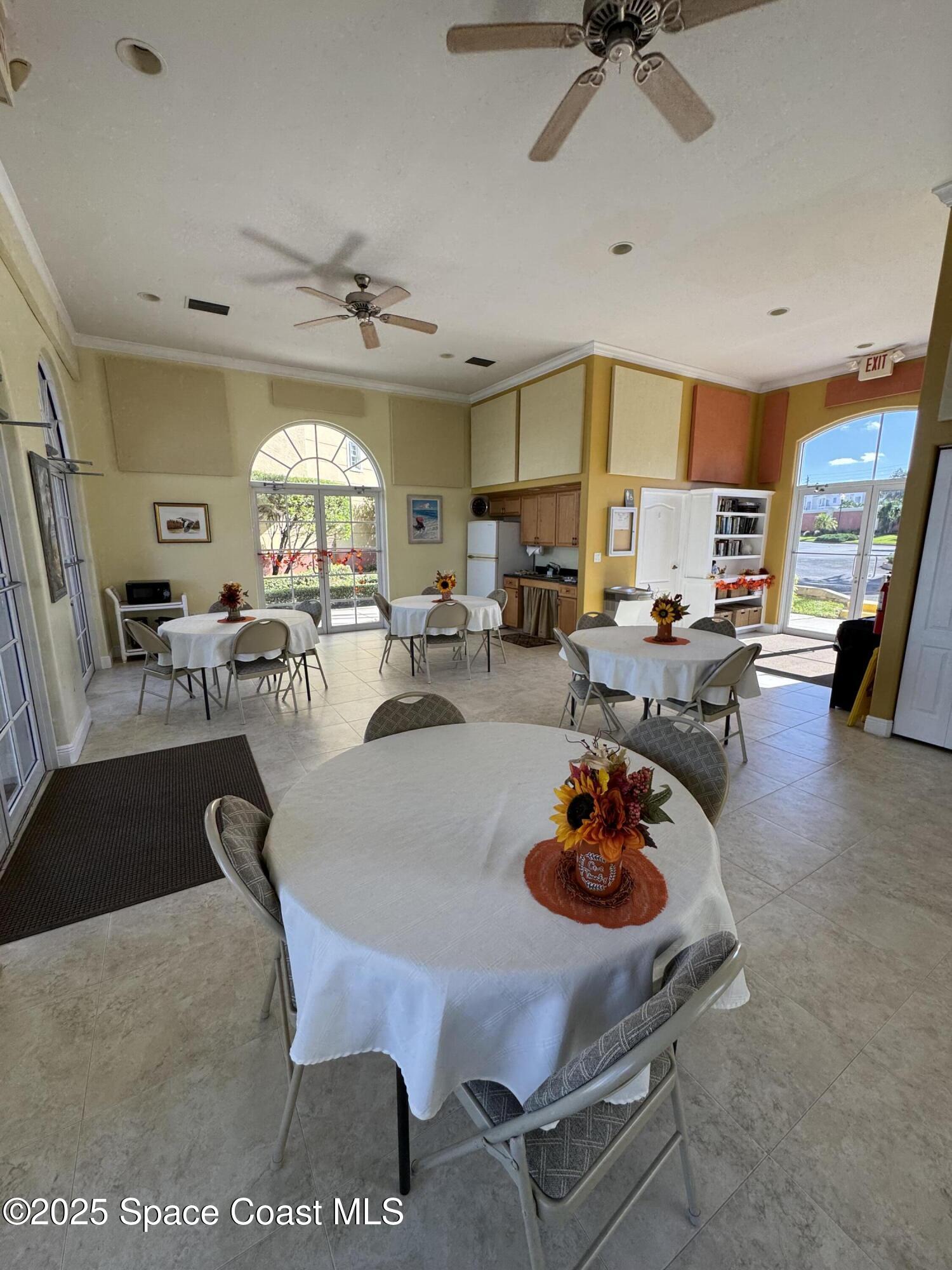 4955 Dixie Highway Northeast, Unit 502 Palm Bay, FL 32905 - Photo 46 of 51 a living room with furniture a rug and a window
