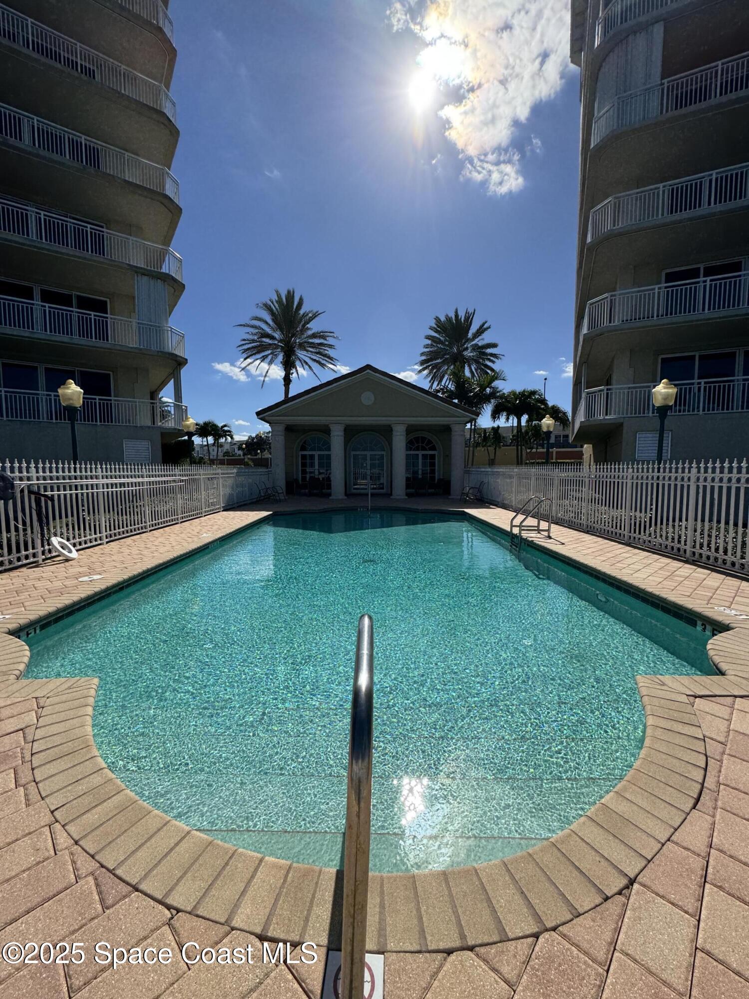 4955 Dixie Highway Northeast, Unit 502 Palm Bay, FL 32905 - Photo 47 of 51 a view of a swimming pool with a patio