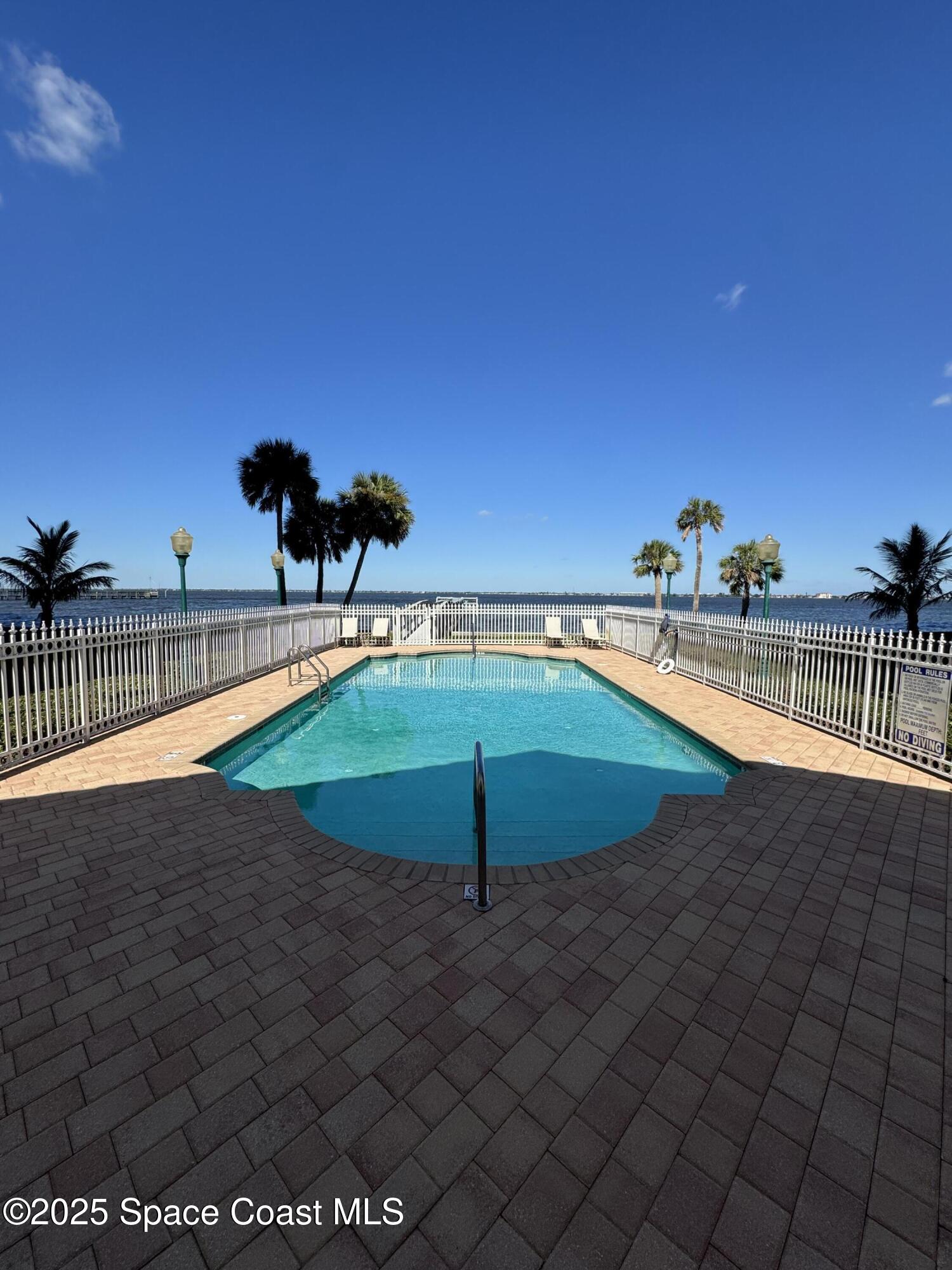 4955 Dixie Highway Northeast, Unit 502 Palm Bay, FL 32905 - Photo 48 of 51 a view of a tennis court