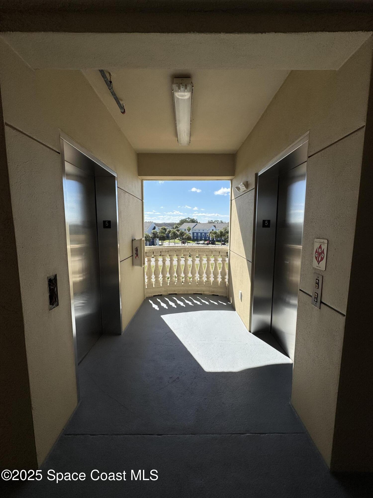 4955 Dixie Highway Northeast, Unit 502 Palm Bay, FL 32905 - Photo 50 of 51 a view of a hallway with a couch