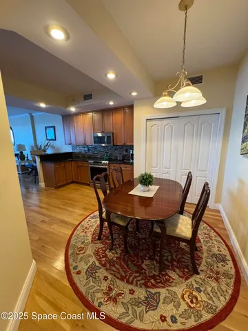 a view of a dining room with furniture
