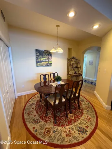 a view of a dining room with furniture