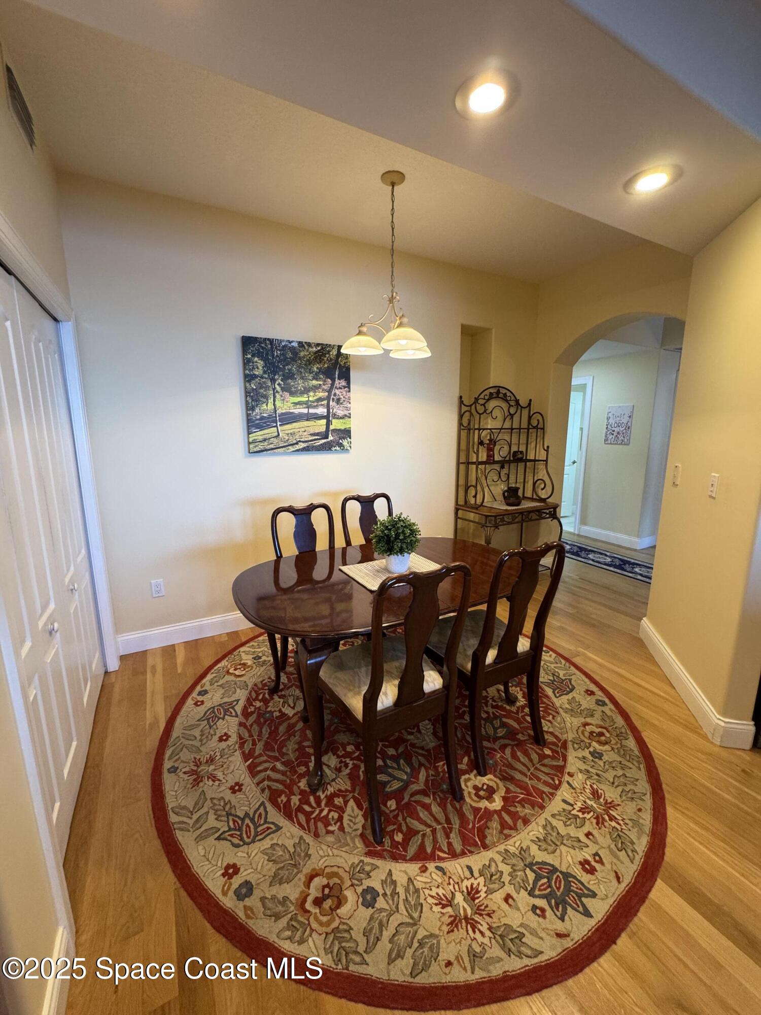 4955 Dixie Highway Northeast, Unit 502 Palm Bay, FL 32905 - Photo 6 of 51 a view of a dining room with furniture