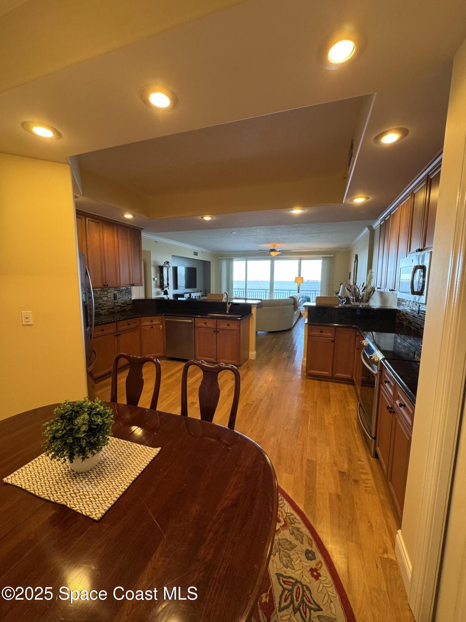 4955 Dixie Highway Northeast, Unit 502 Palm Bay, FL 32905 - Photo 7 of 51 a view of a dining room with furniture