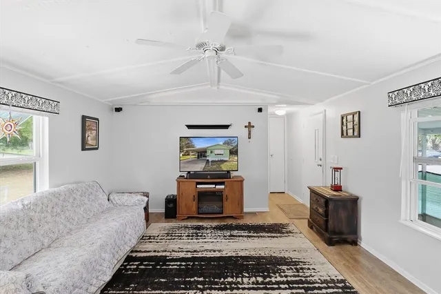 a living room with furniture and a rug