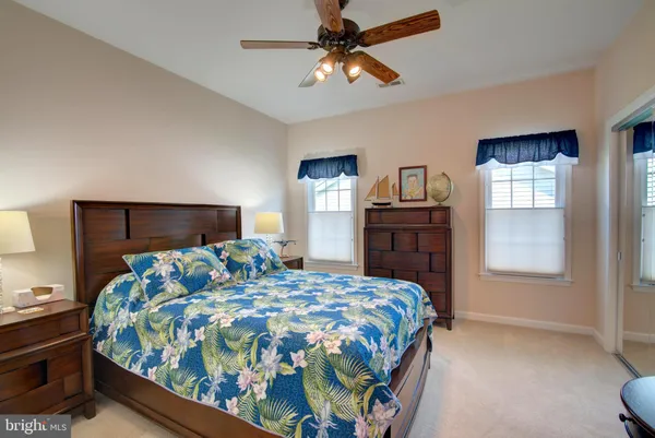 a bedroom with a bed and closet