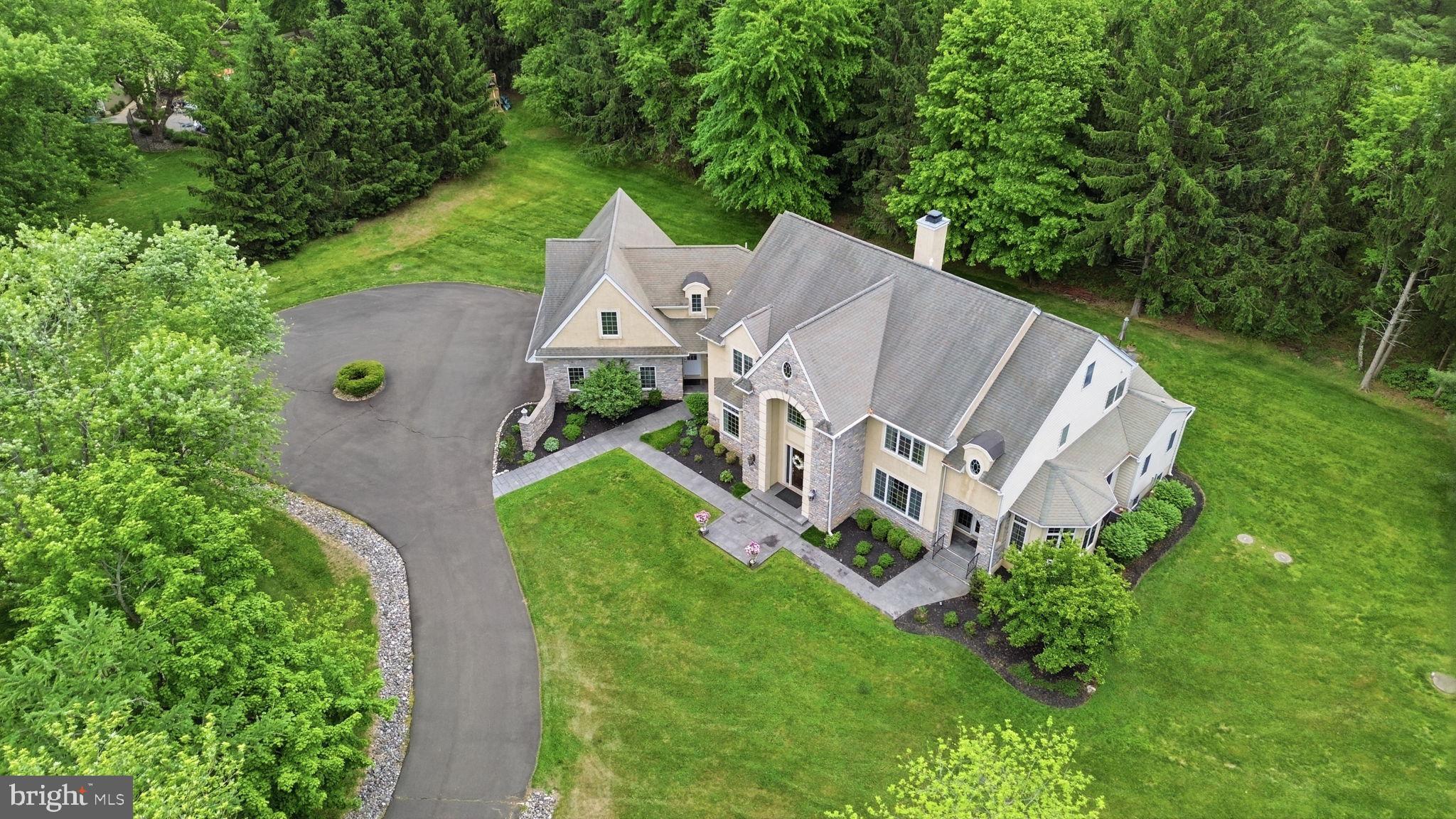 1588 Wrightstown Road Newtown, PA 18940 - Photo 77 of 81 an aerial view of a house with a yard