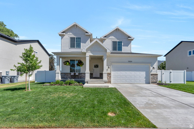 2664 West Maple Street Mapleton, UT 84664 - Photo 1 of 49 Two-story residence featuring light-colored siding and stone veneer accents