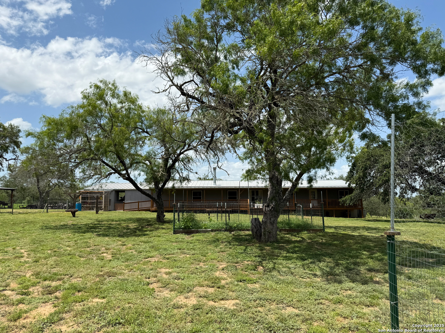 227 River Bluff Drive Lytle, TX 78052 - Photo 41 of 45 a front view of a house with garden