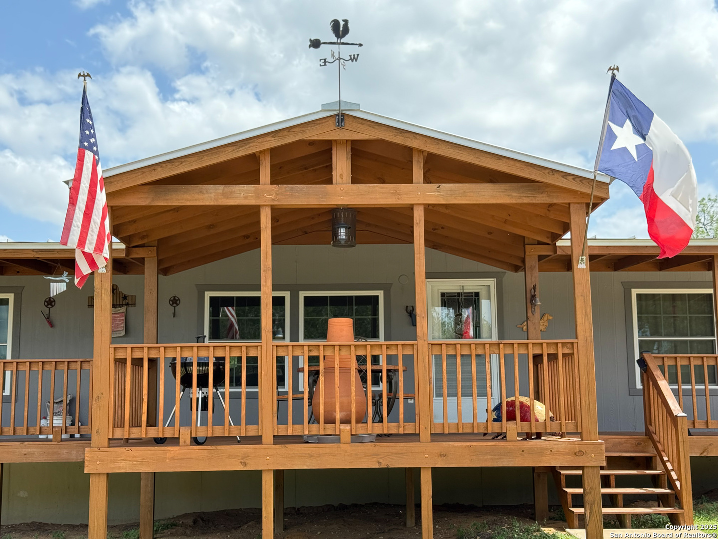 227 River Bluff Drive Lytle, TX 78052 - Photo 6 of 45 a front view of a house with a porch