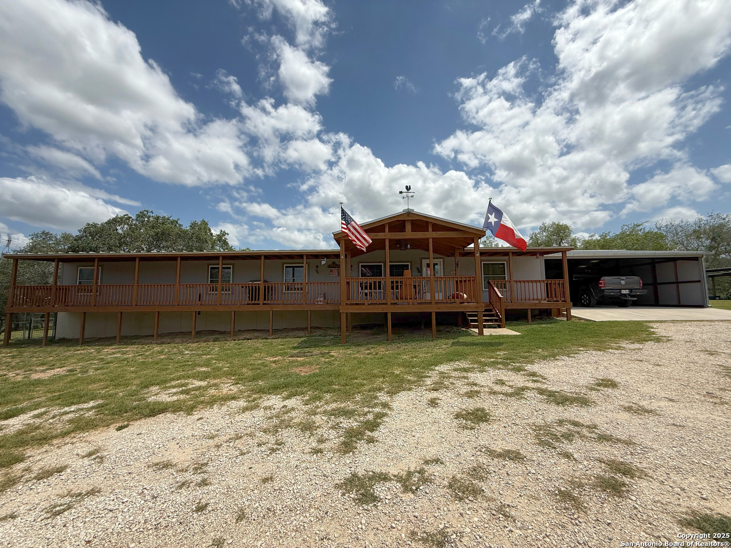 227 River Bluff Drive Lytle, TX 78052 - Photo 7 of 45 a view of a house with a yard