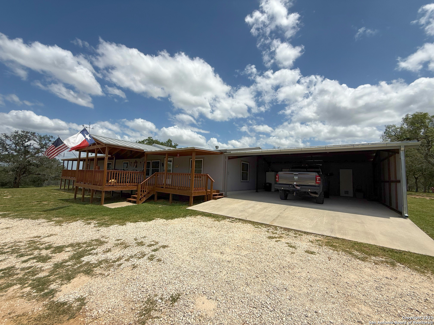 227 River Bluff Drive Lytle, TX 78052 - Photo 8 of 45 a view of a house with a yard
