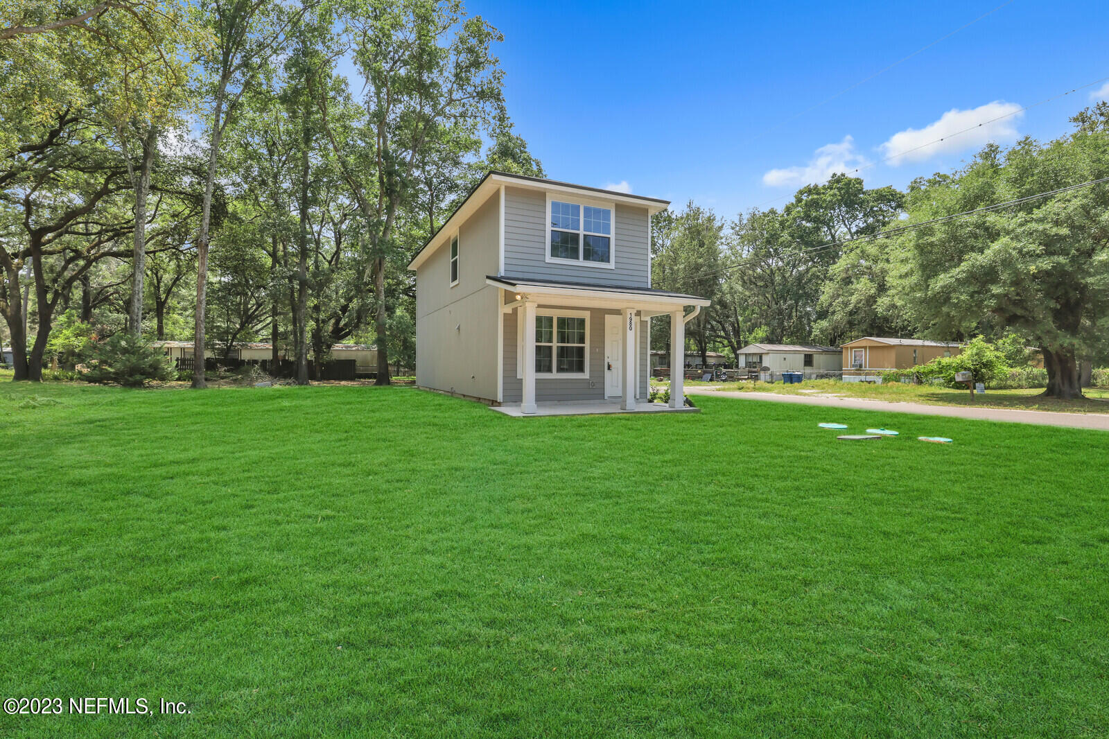 a house view with a garden space