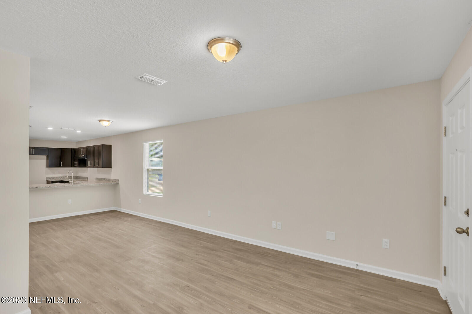 1705 Wright Avenue Jacksonville, FL 32207 - Photo 6 of 22 a view of empty room with wooden floor and fan