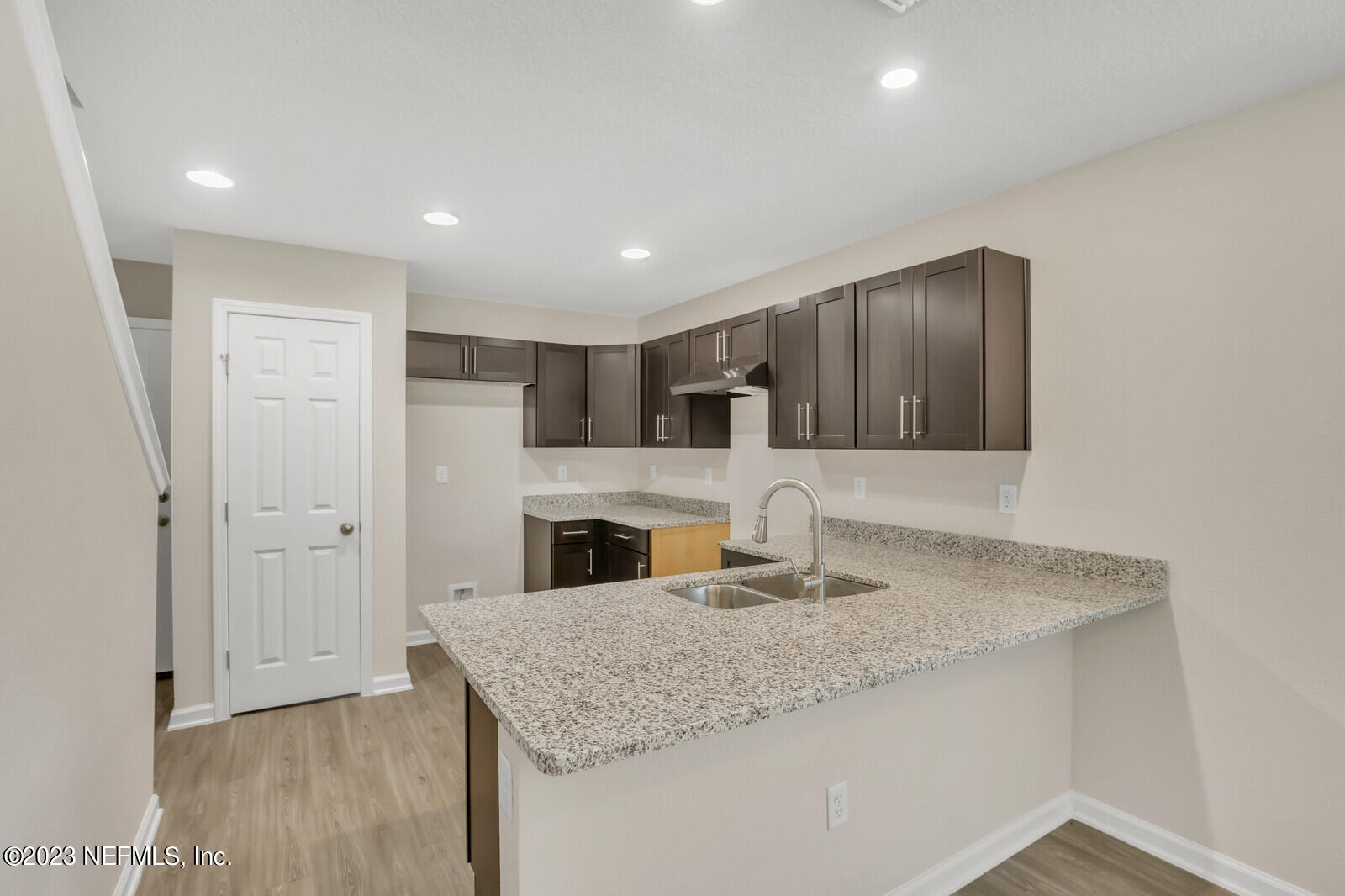 1705 Wright Avenue Jacksonville, FL 32207 - Photo 8 of 22 a kitchen with granite countertop sink stainless steel appliances and cabinets