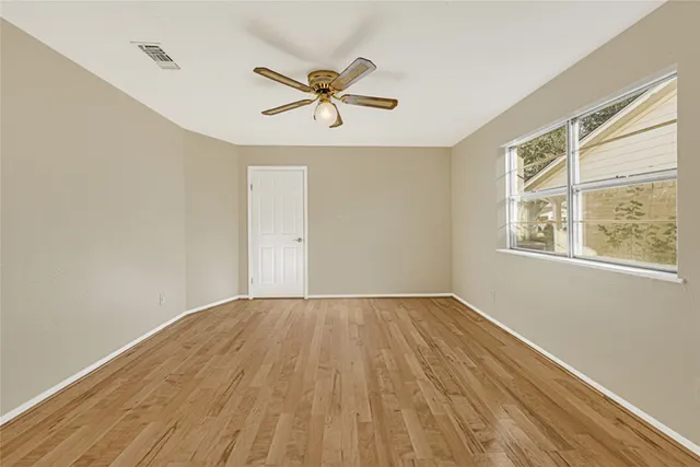 a view of walk in closet with rug