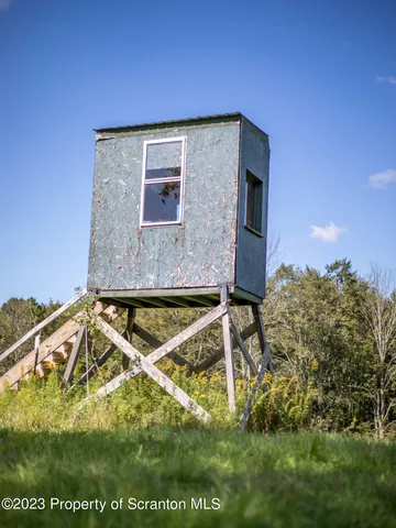 a view of a golf course with a lake