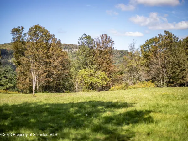a view of swimming pool with an outdoor space and seating area