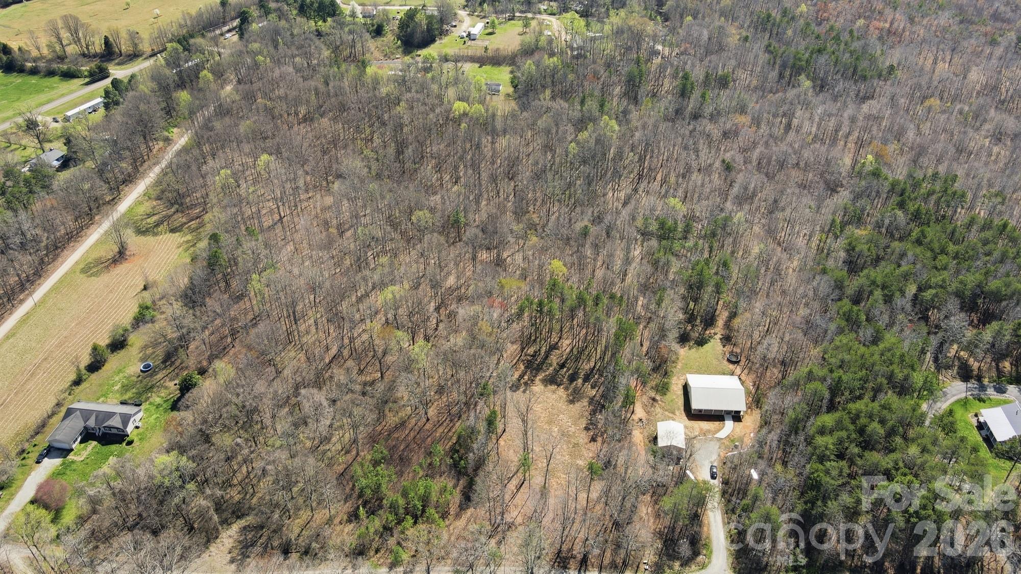 179 Genesis Place Cleveland, NC 27013 - Photo 3 of 9 a bird view of a house with a yard and lake view