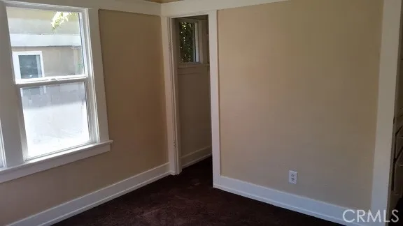 1060 Cherry Long Beach, CA 90813 - Photo 17 of 63 an empty room with windows and closet