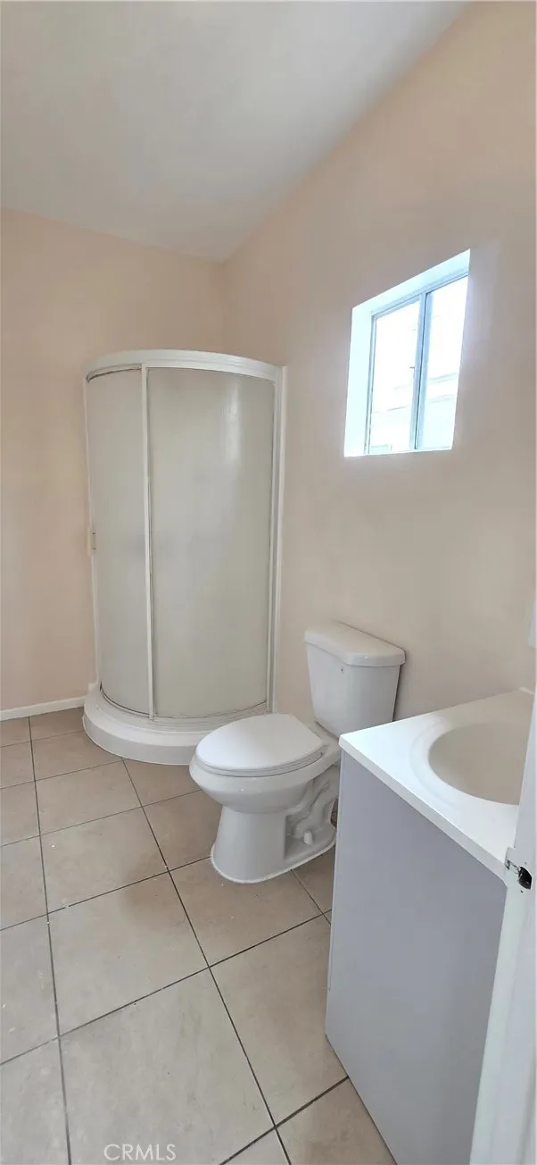 1060 Cherry Long Beach, CA 90813 - Photo 42 of 63 a white toilet sitting next to a bathroom sink and tub