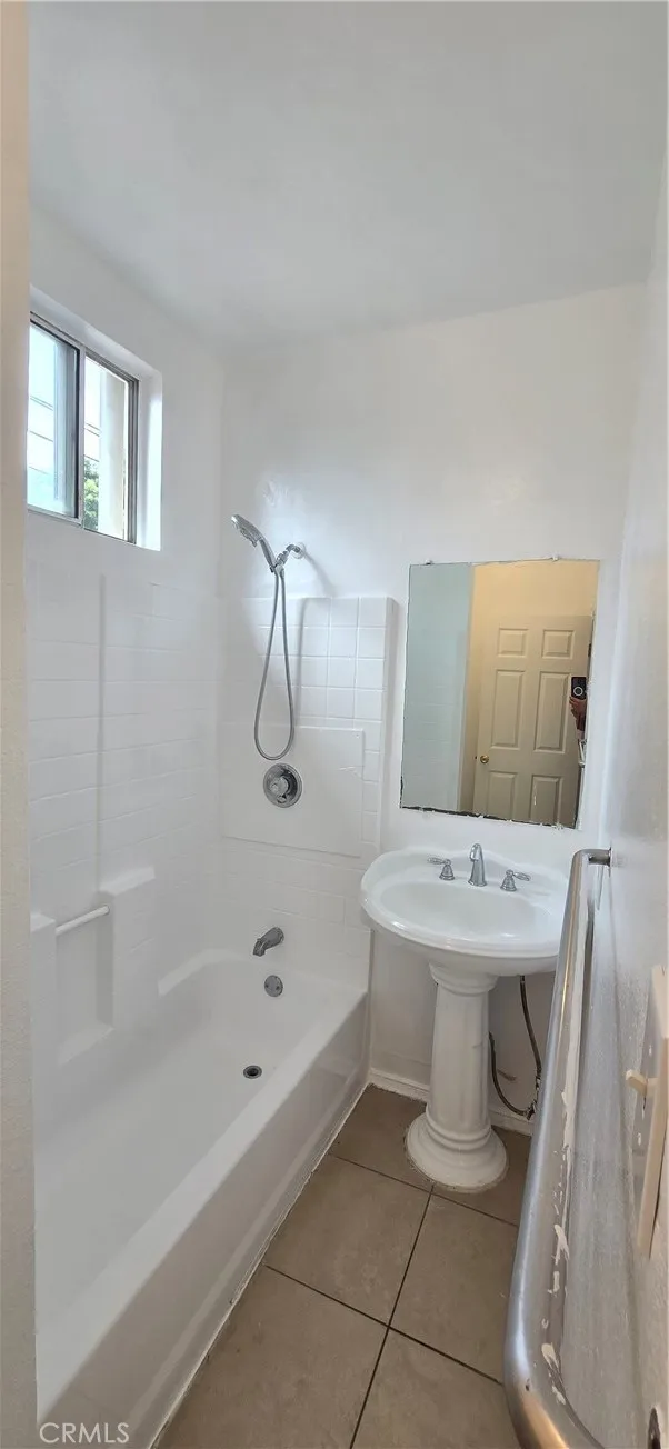 1060 Cherry Long Beach, CA 90813 - Photo 50 of 63 a bathroom with a sink a toilet and shower