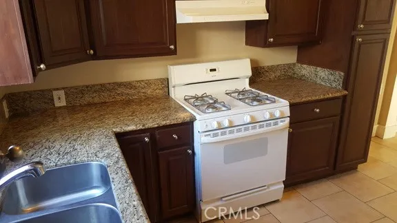 1060 Cherry Long Beach, CA 90813 - Photo 5 of 63 a kitchen with a stove and a sink