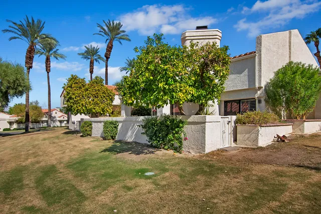 a view of a house with a street