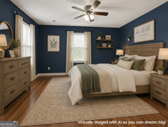 1825 Harden Road Zebulon, GA 30295 - Photo 17 of 32 a bedroom with a large bed and a window