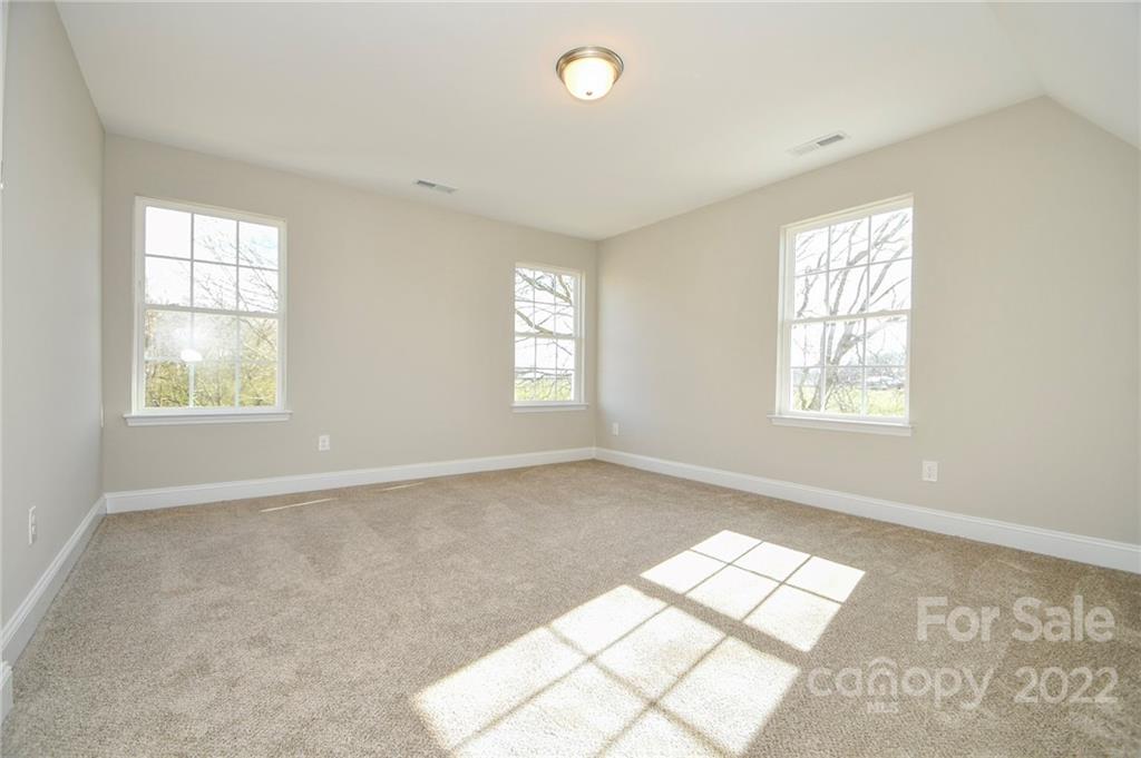5413 Austin Road, Unit 4 Monroe, NC 28112 - Photo 17 of 22 an empty room with windows
