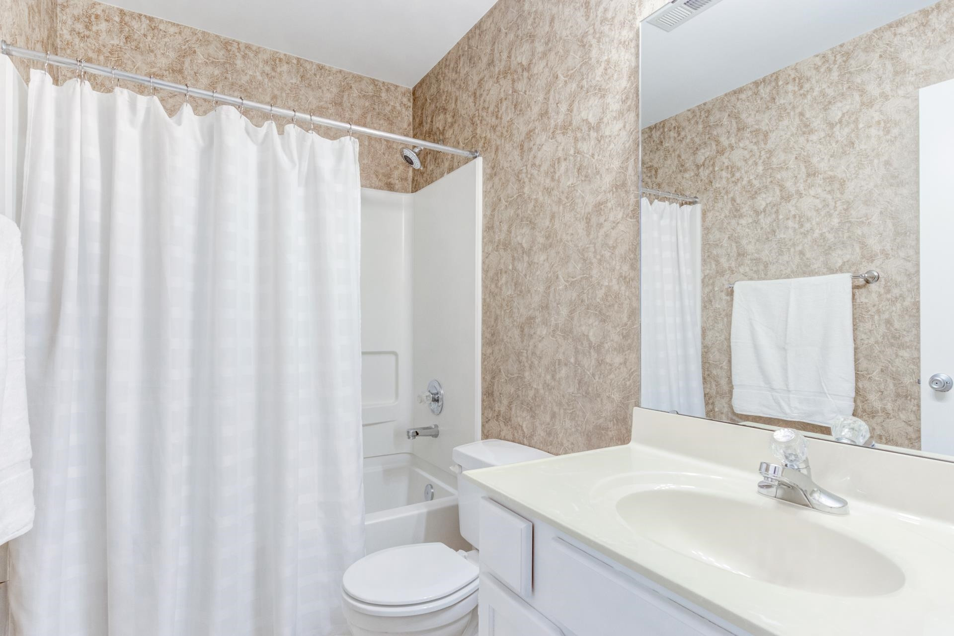 4205 Sunscape Lane Raleigh, NC 27613 - Photo 19 of 23 This full bath is perfect for the secondary bedroom. Hall Bath