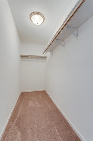 a view of a room with an empty space