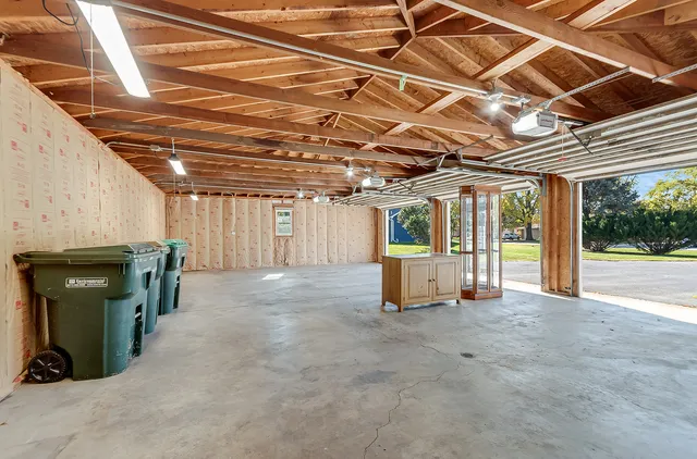 a view of an empty room with a fireplace