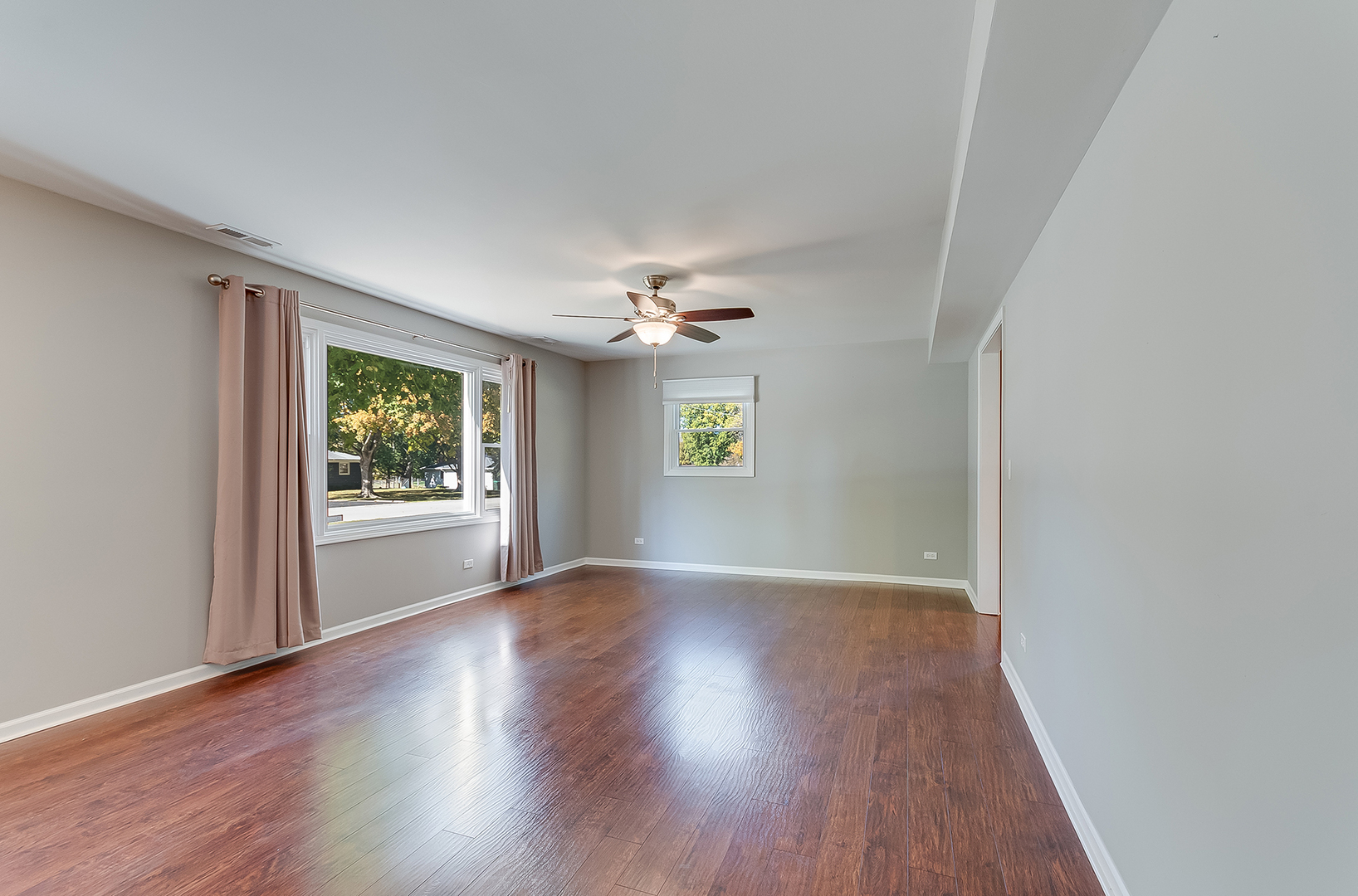 22503 South Deal Avenue Channahon, IL 60410 - Photo 9 of 33 a view of an empty room with wooden floor and a window