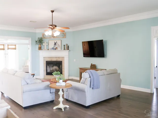 a kitchen with a stove a sink a counter space and a window