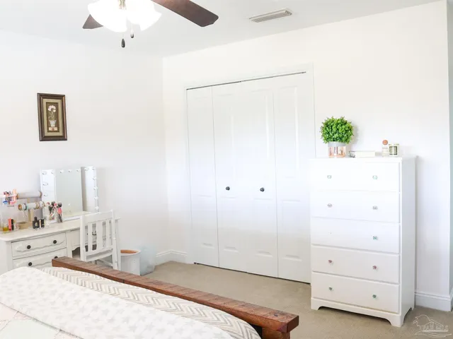 a bathroom with a shower and a mirror
