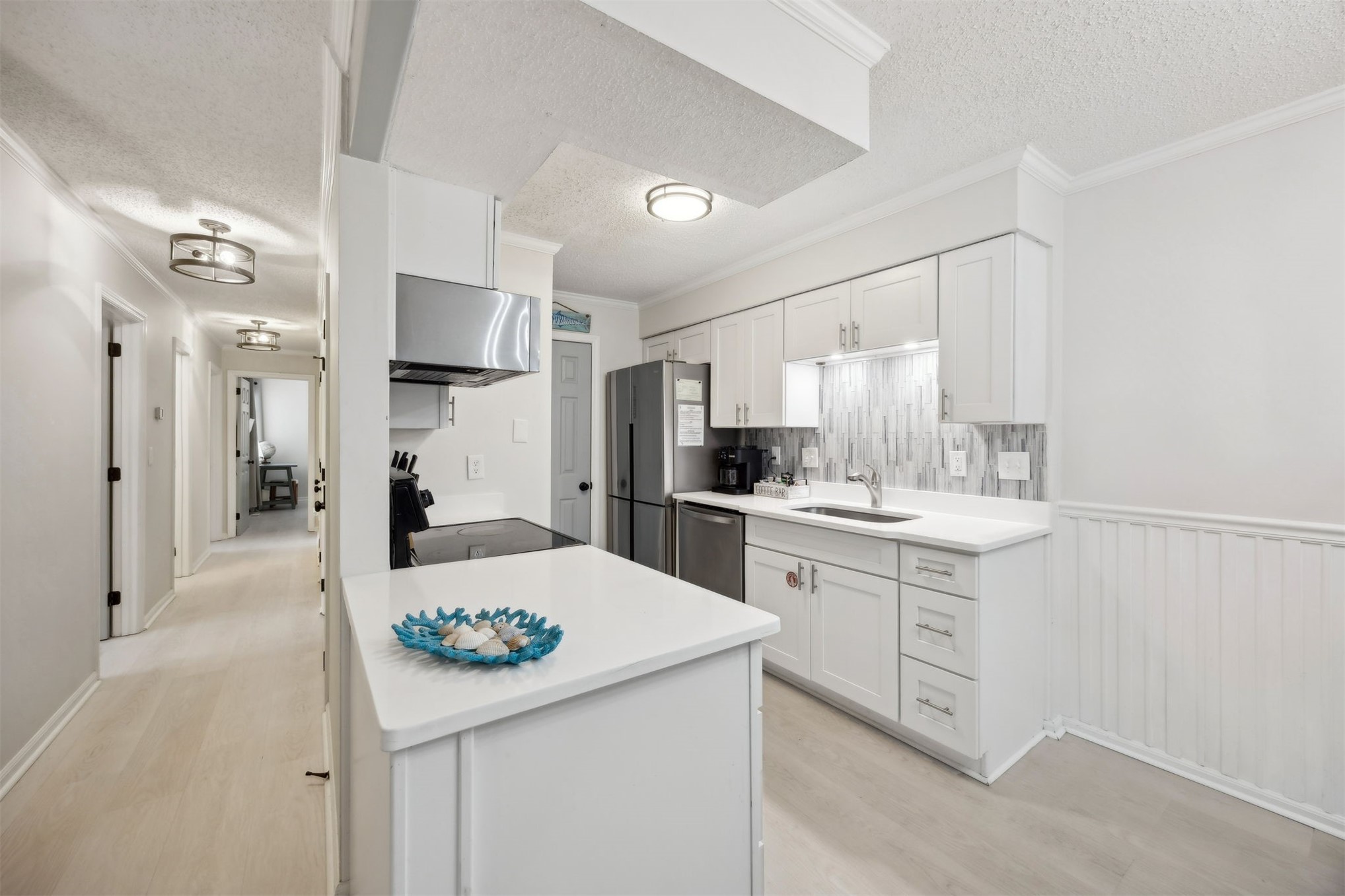 2562 Forest Ridge Drive, Unit P2 Fernandina Beach, FL 32034 - Photo 8 of 37 Fully remodeled Kitchen with new quartz countertops, new tile backsplash, new appliances, new cabinetry
