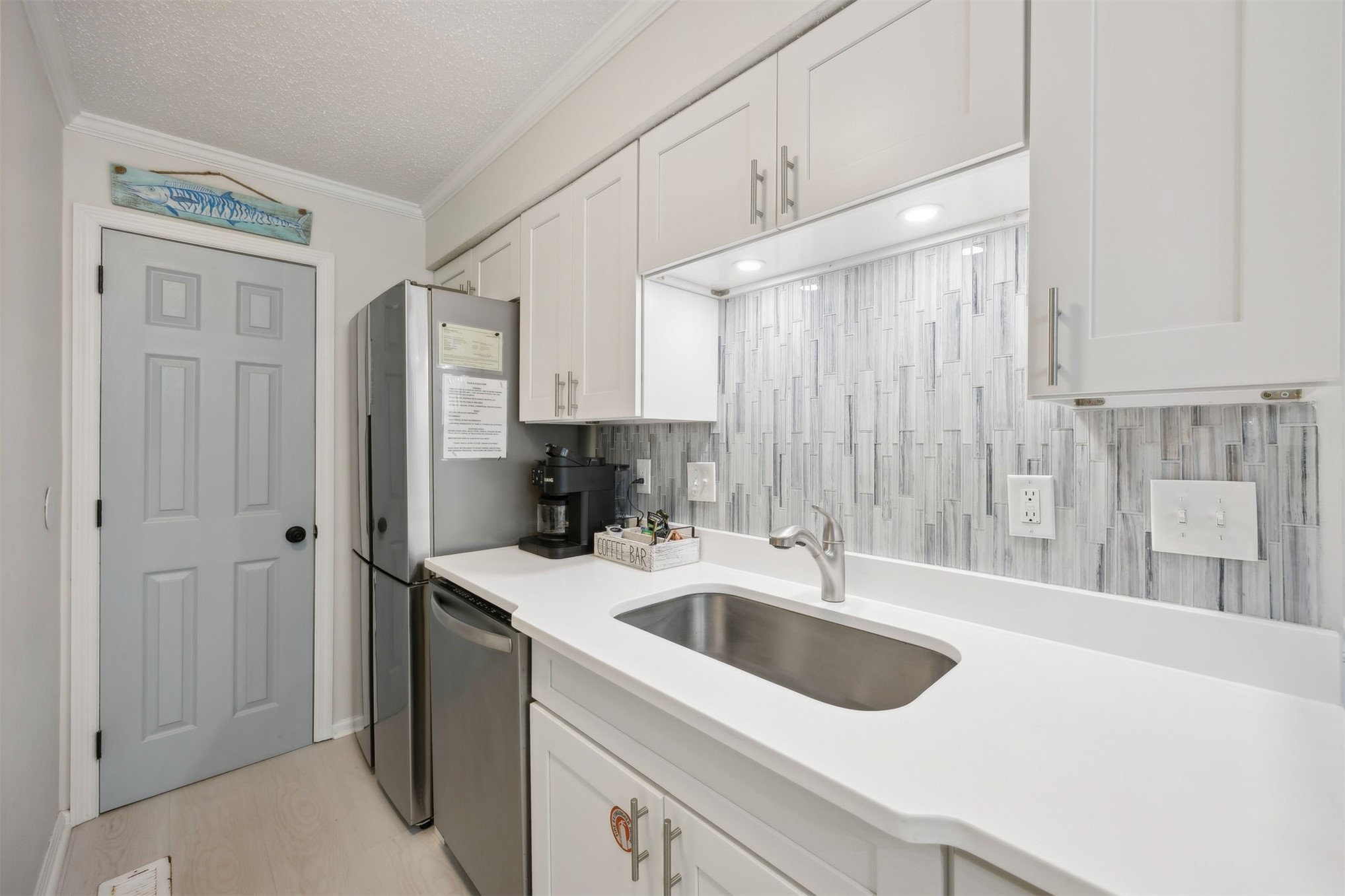 2562 Forest Ridge Drive, Unit P2 Fernandina Beach, FL 32034 - Photo 10 of 37 Kitchen-New Cabinets, New Quartz Countertops, New Tile Backsplash, Newer Appliances