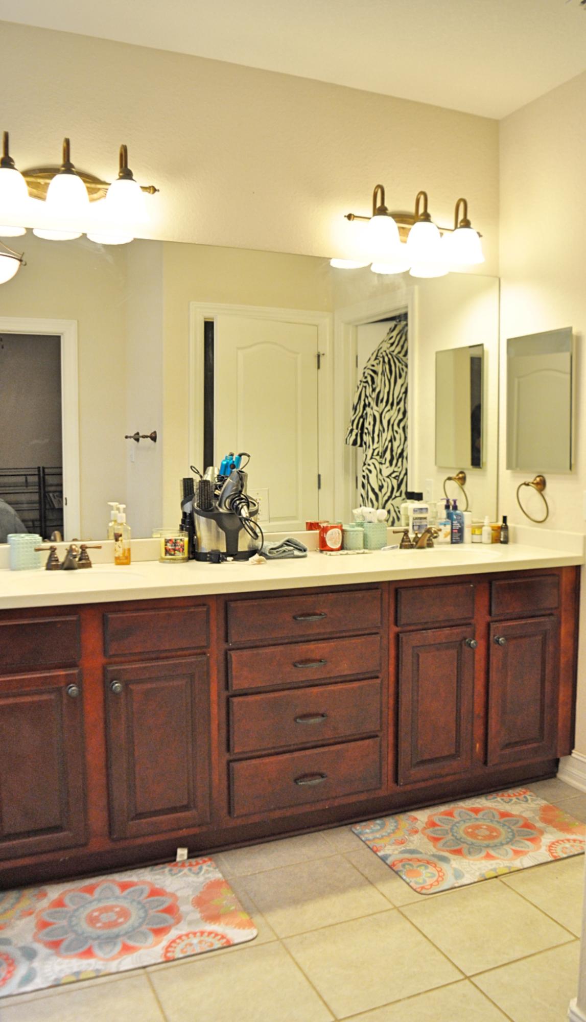 216 Mango Lane Freeport, FL 32439 - Photo 17 of 44 a bathroom with a sink and a mirror