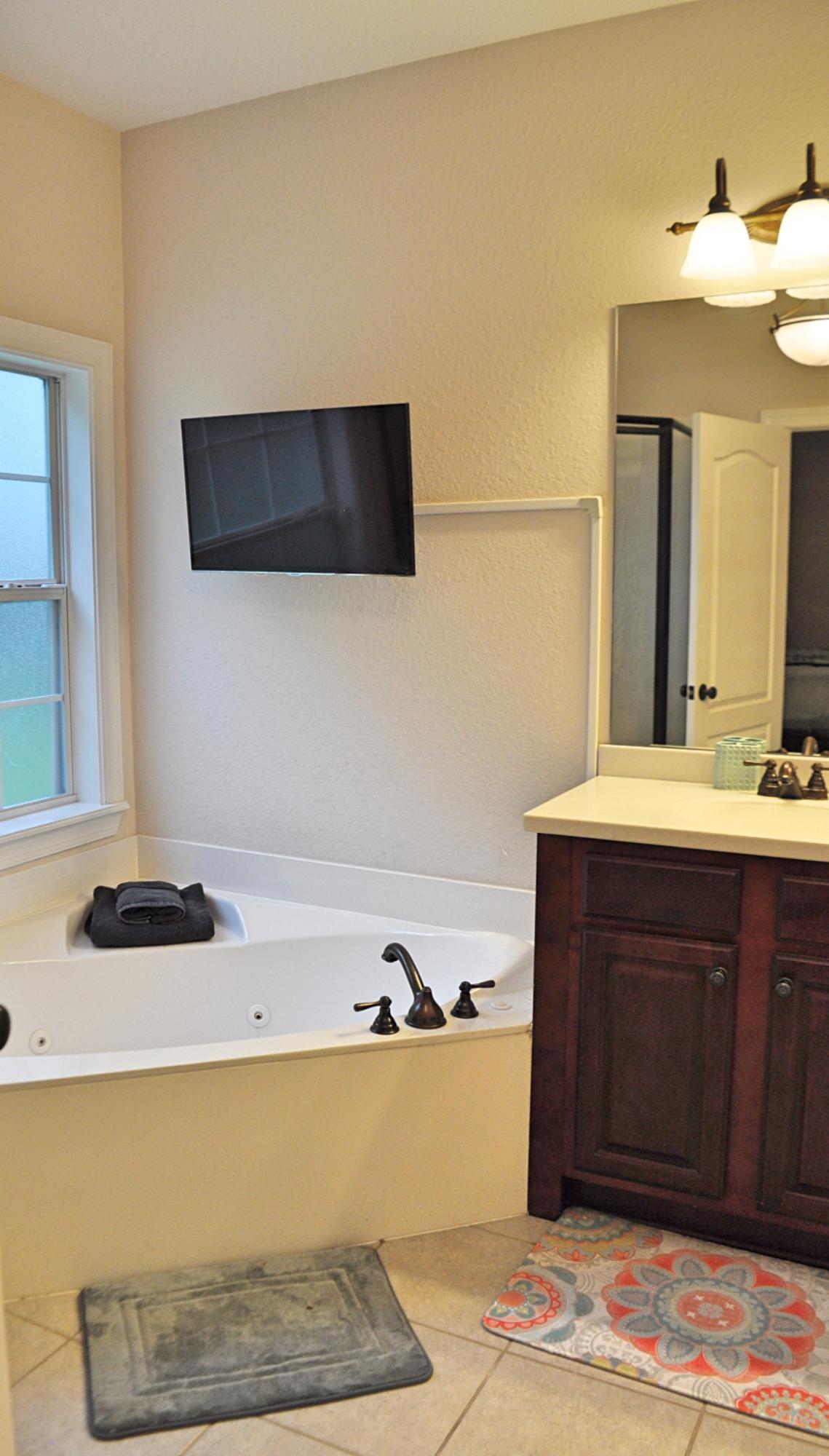 216 Mango Lane Freeport, FL 32439 - Photo 18 of 44 a bathroom with a sink and a mirror