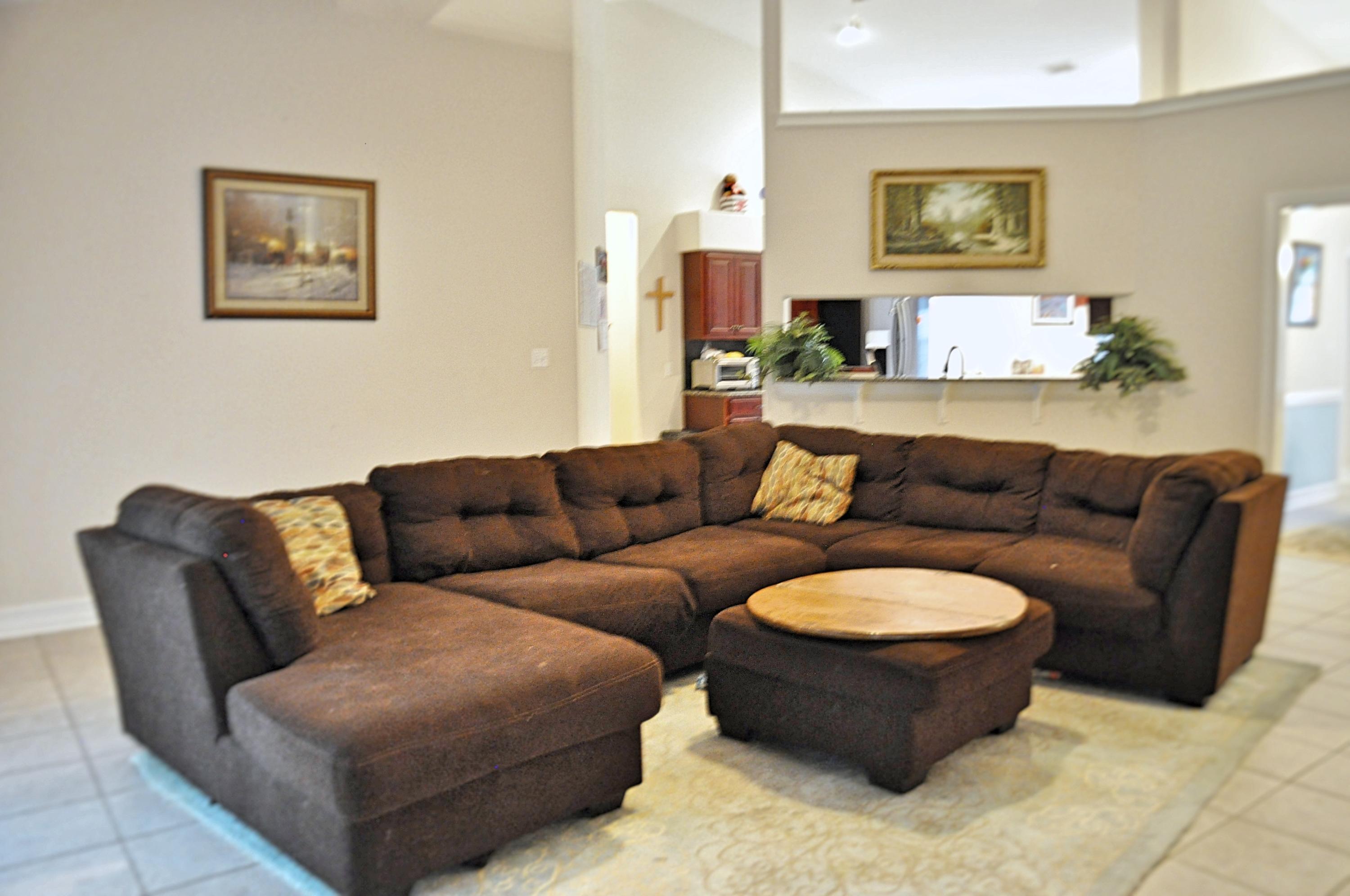 216 Mango Lane Freeport, FL 32439 - Photo 5 of 44 a living room with furniture and a couch
