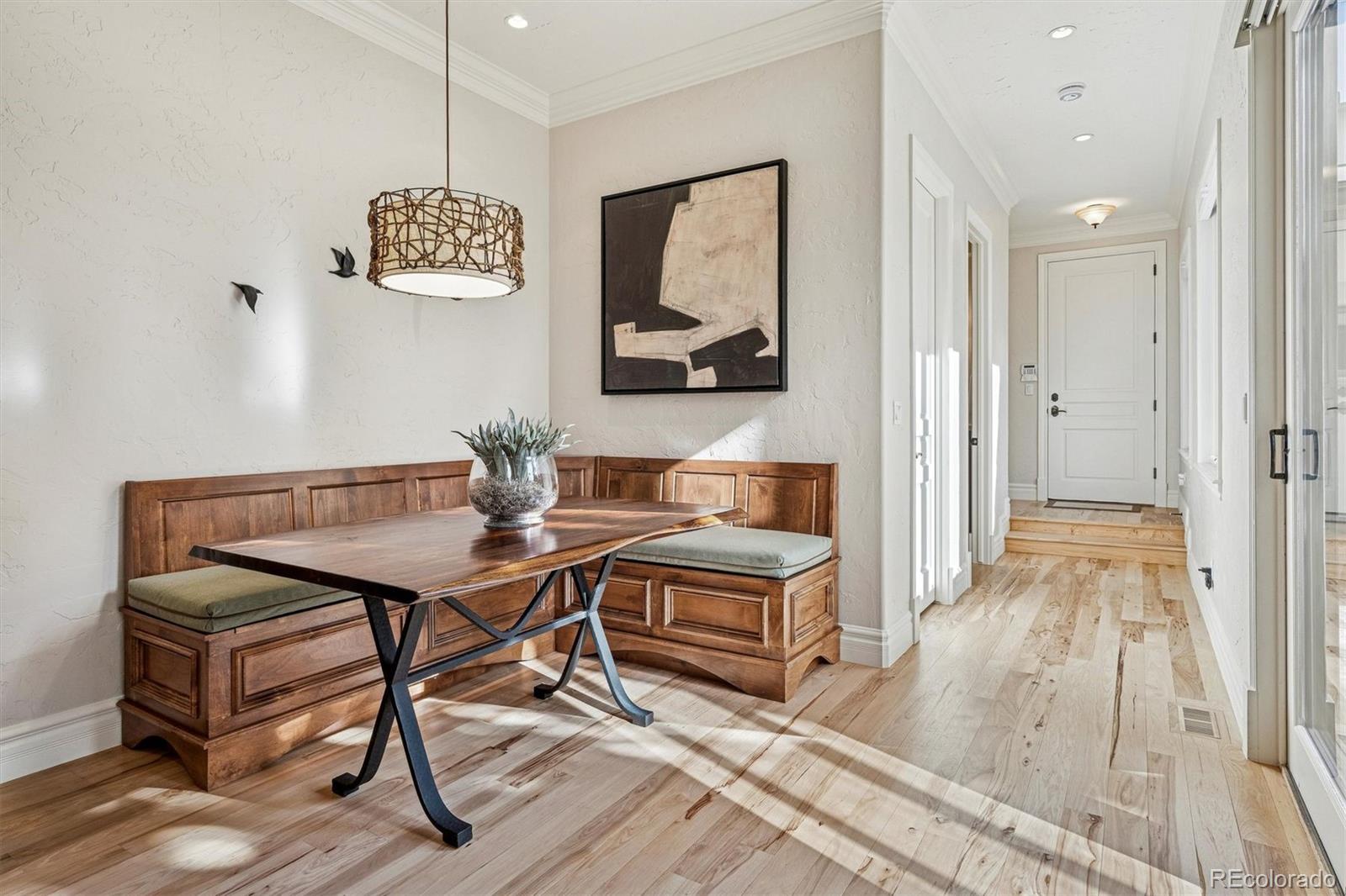 542 Adams Street Denver, CO 80206 - Photo 12 of 31 a view of a livingroom with furniture and wooden floor
