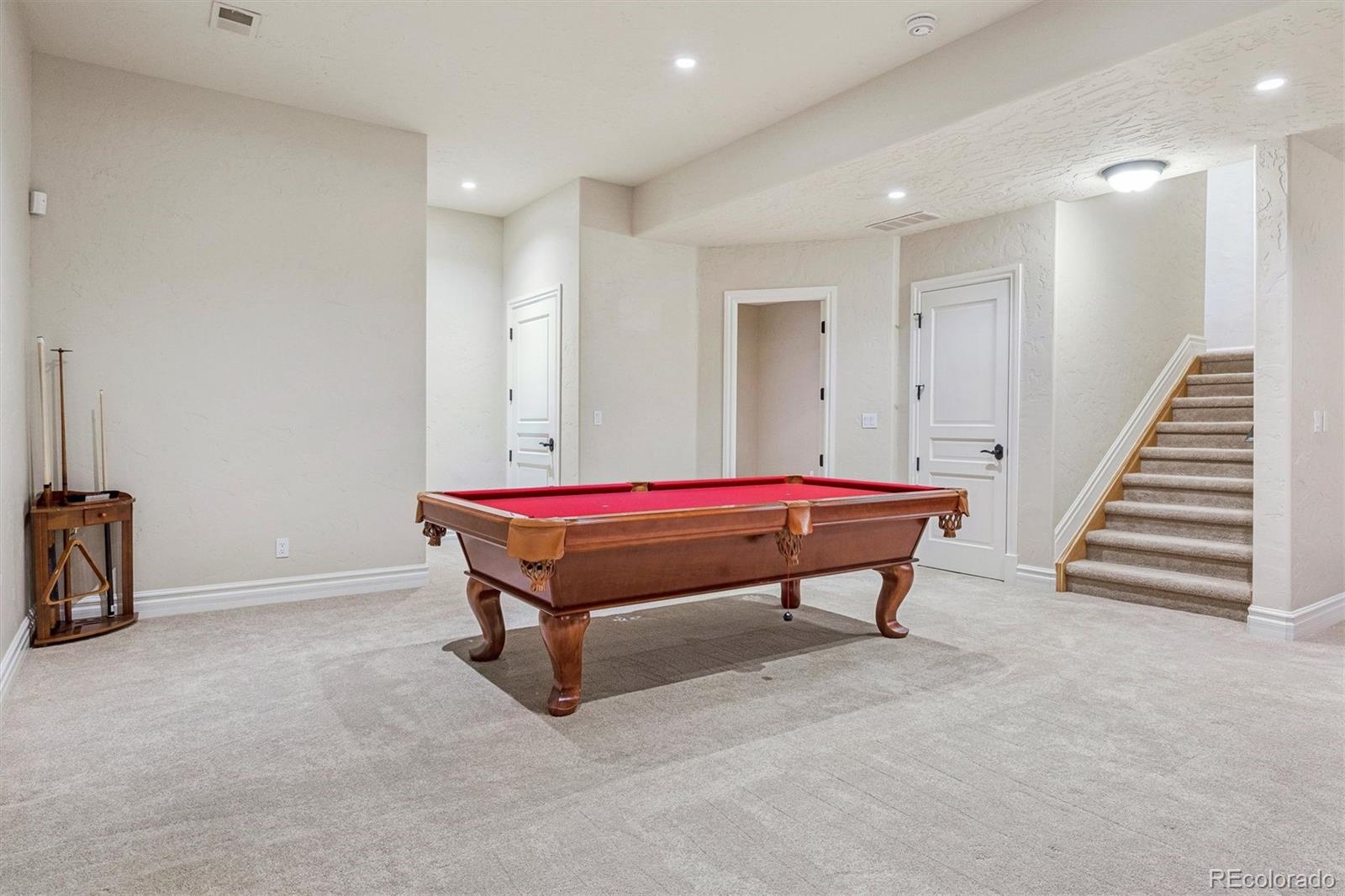542 Adams Street Denver, CO 80206 - Photo 18 of 31 a room with pool table and windows