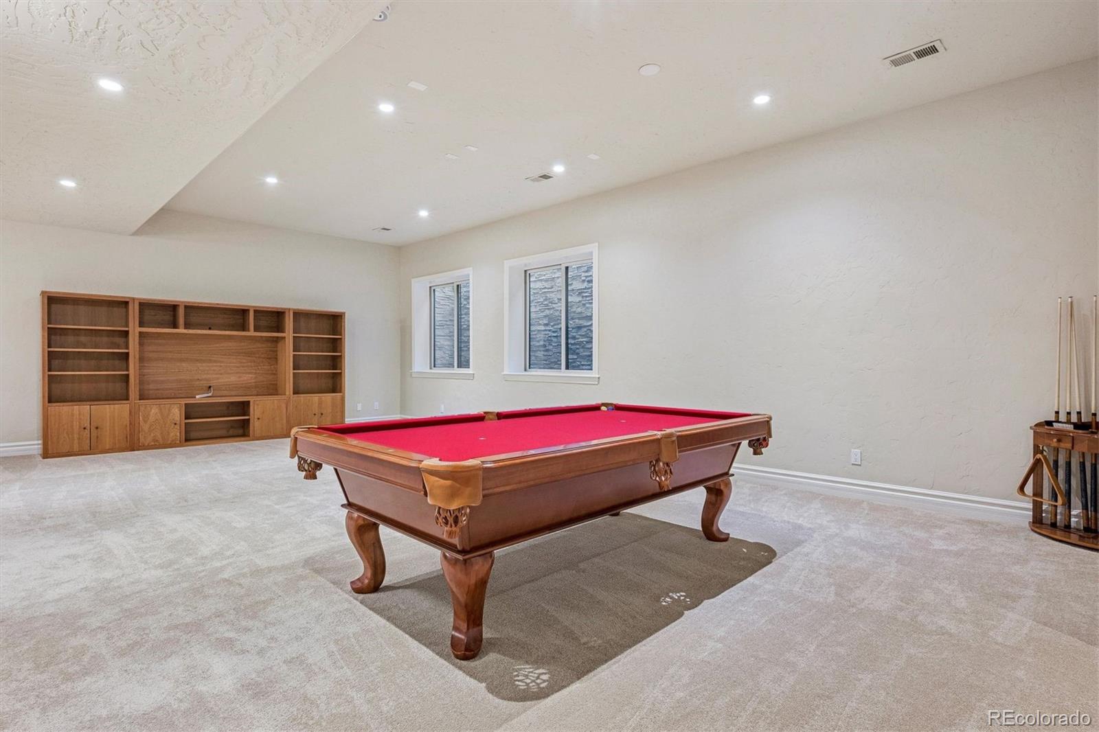 542 Adams Street Denver, CO 80206 - Photo 19 of 31 a room with pool table and projector