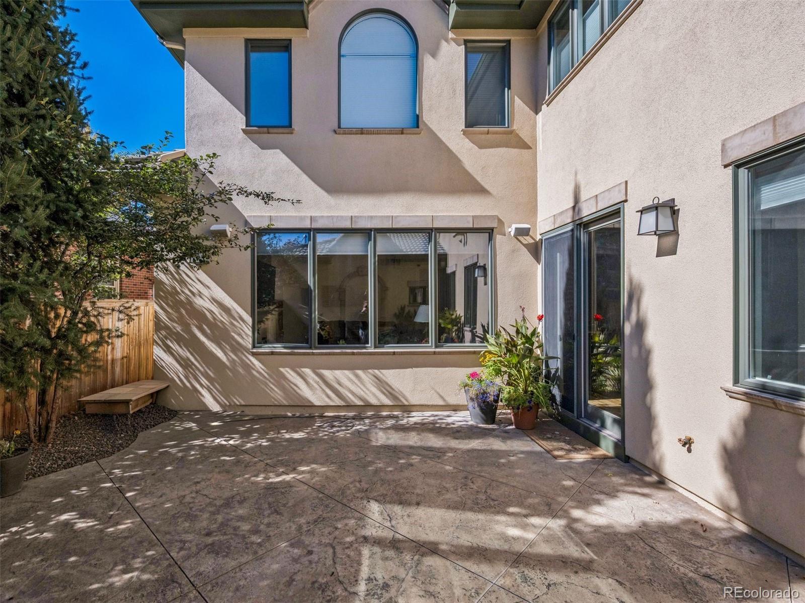 542 Adams Street Denver, CO 80206 - Photo 25 of 31 a house view with a outdoor space
