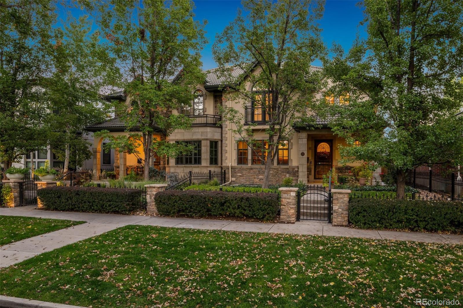 542 Adams Street Denver, CO 80206 - Photo 3 of 31 a front view of a house with garden