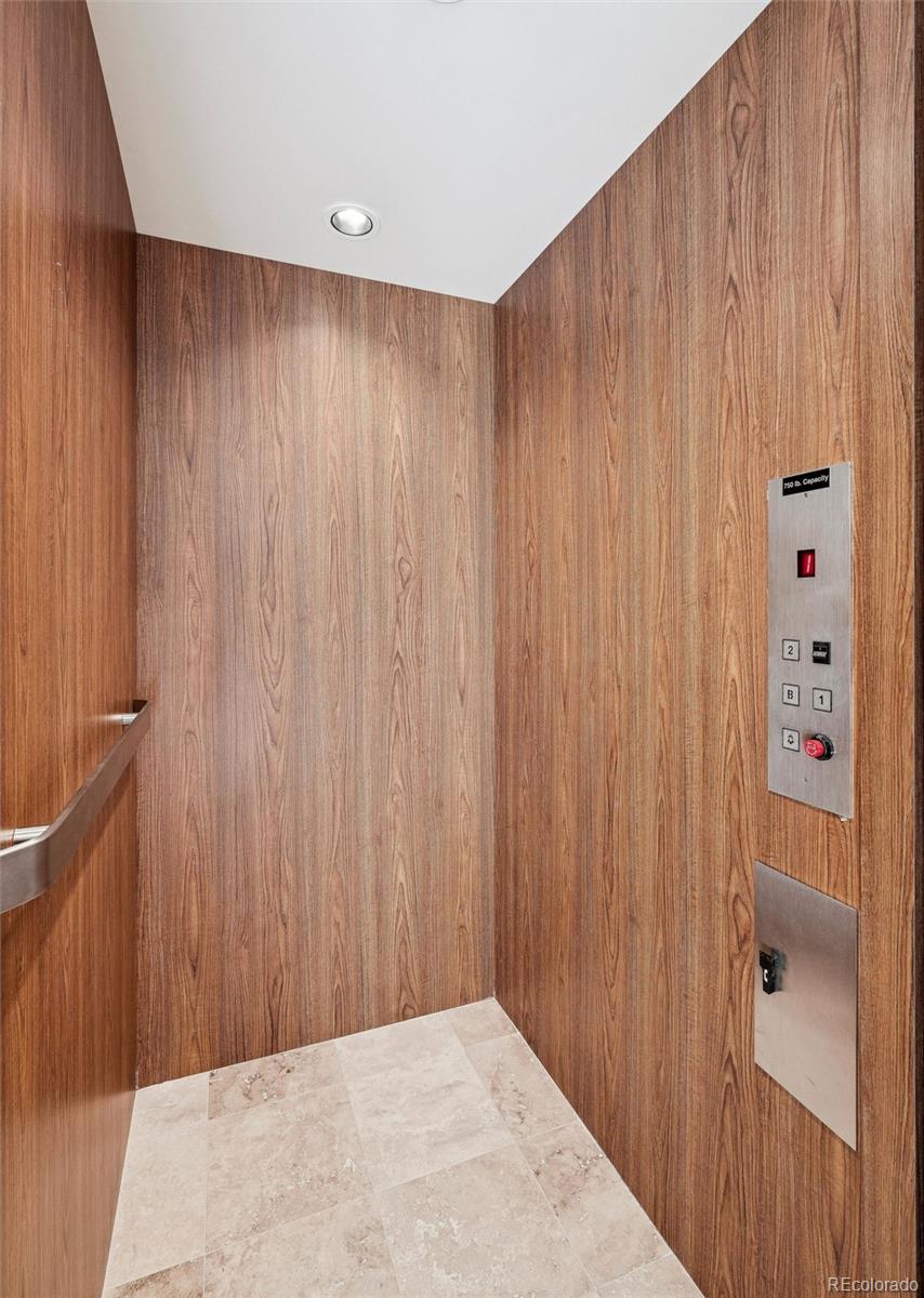 542 Adams Street Denver, CO 80206 - Photo 6 of 31 a view of a utility room with a wooden wall