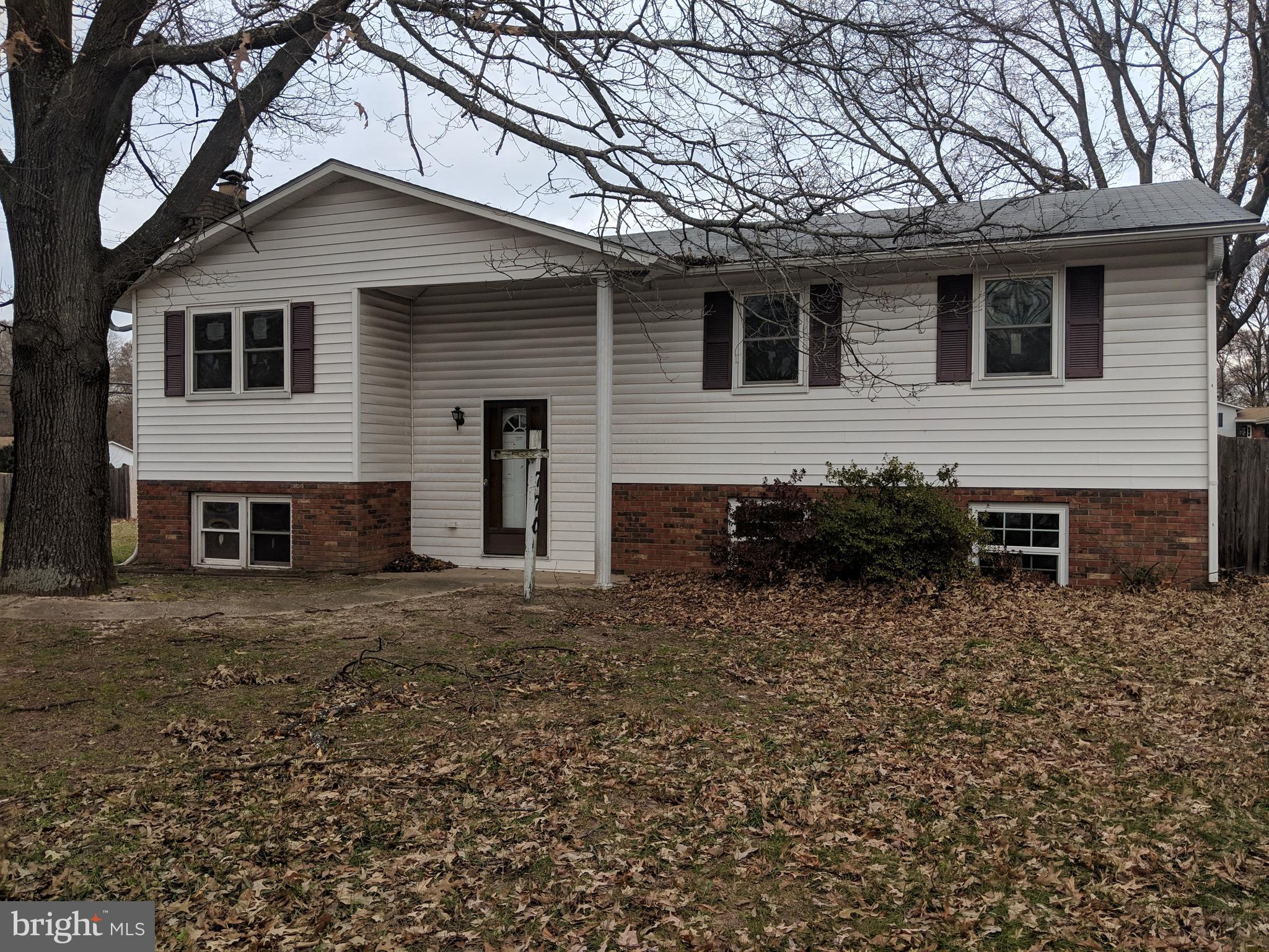 770 Elmhurst Road Severn, MD 21144 - Photo 3 of 26 a front view of a house with garden